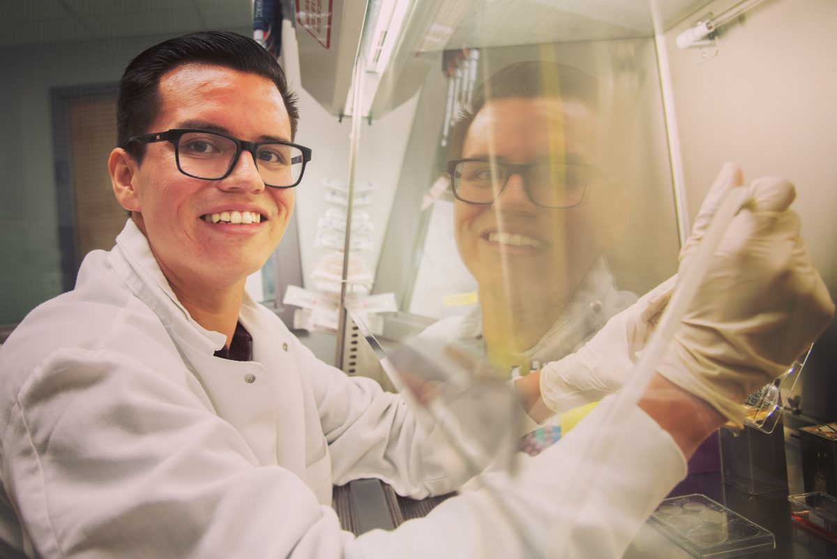 Photo of graduate student Jose Martinez in the lab