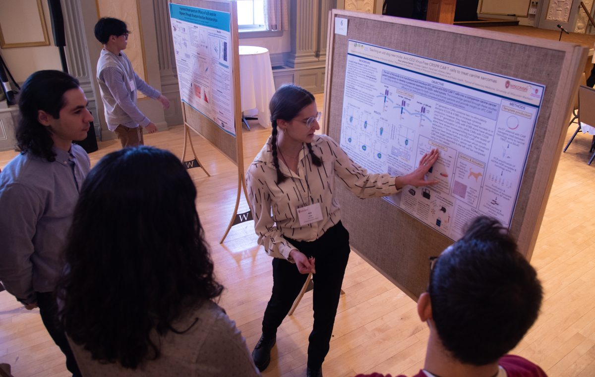 BTP trainee explains research at poster session